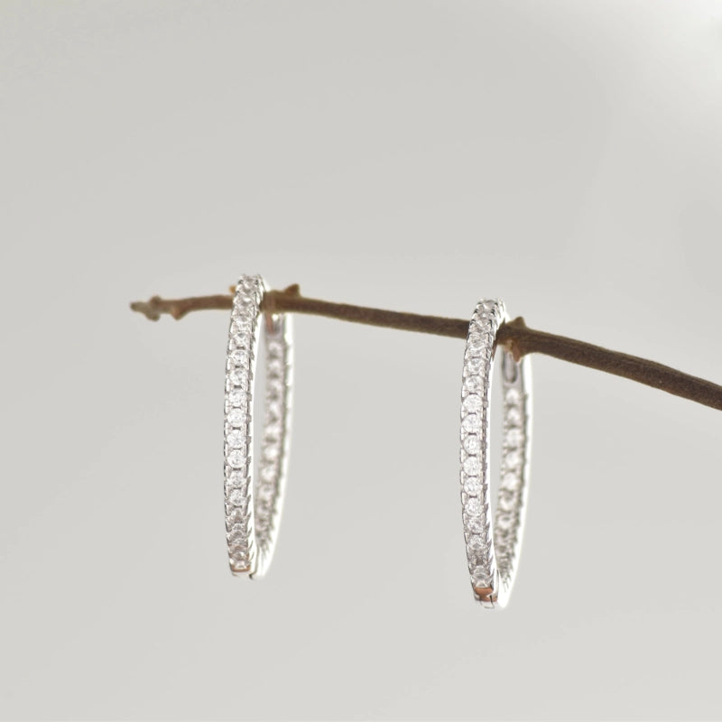 Glistening Rhodium Plated Silver Hoop Earrings